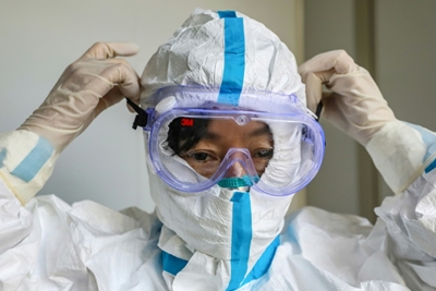 Doctors at China's virus epicentre overworked and unprotected