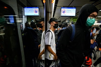 Hong Kong protesters call student boycott, strike after weekend of violence