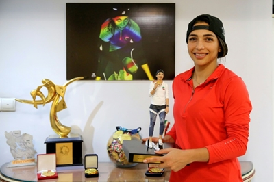Athletics star takes to rooftop to train in virus-hit Iran