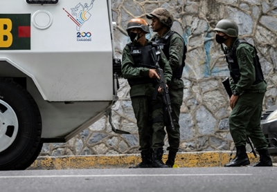 Life in the crossfire of Venezuela's slums