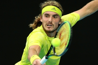 Tsitsipas survives five-set marathon to reach last 32 in Melbourne