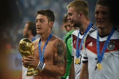 Mesut Ozil - from integration poster boy to racism storm