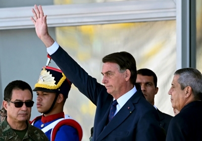 Brazil's Bolsonaro flexes muscles with military parade