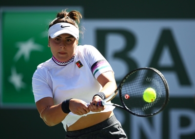 Aggressive Andreescu overwhelms Muguruza to reach Indian Wells semi-finals