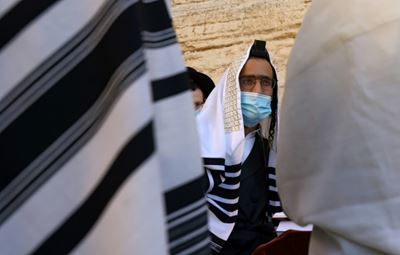 Virus forges path to new life for Israeli ultra-Orthodox Jews