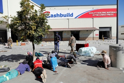South Africa's unrest death toll rises to 32 as looting continues 