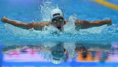 'Iron Lady' Hosszu swims to 60th gold medal