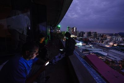 Blackout darkens much of Venezuela in latest taste of economic woes