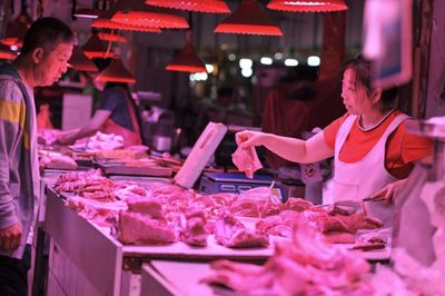 China factory price inflation slips as trade war pressure grows
