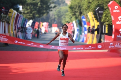 Top runners brave pollution, pandemic in Delhi half marathon