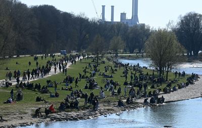 Merkel seizes reins as German states dither over virus