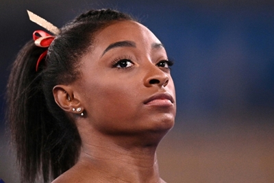 Biles' Olympic fate in balance as support pours in 