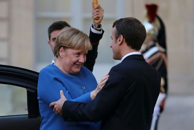 Macron, Merkel meet to harmonise positions before EU summit