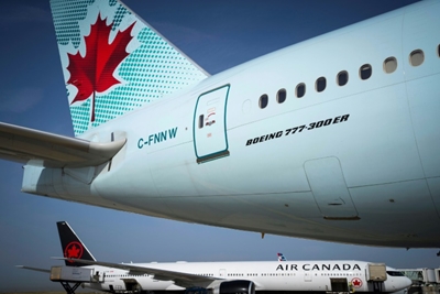 Air Canada to temporarily lay off half its workforce