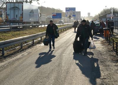 Ukrainian refugees camp out at Polish train station  