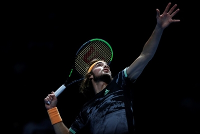 Tsitsipas reaches ATP Finals semis after Nadal comeback