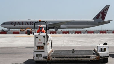 Qatar flies to the rescue, winning plaudits as virus halts aviation