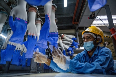US to seize gloves made by Malaysian firm over forced labour