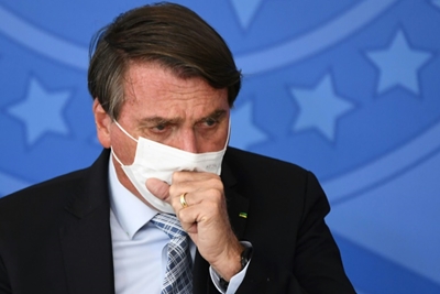 Bolsonaro changes health minister again, as Brazil's Covid cases surge