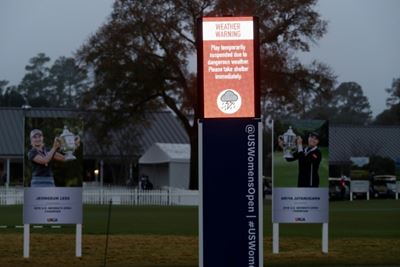 Leaders in limbo as storm delay hits US Women's Open