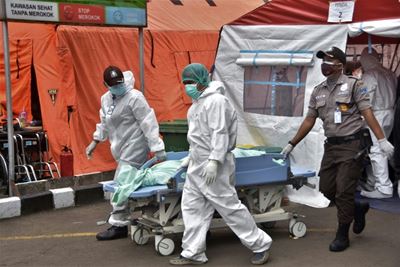 Indonesia to impose 'emergency' curbs to battle virus surge