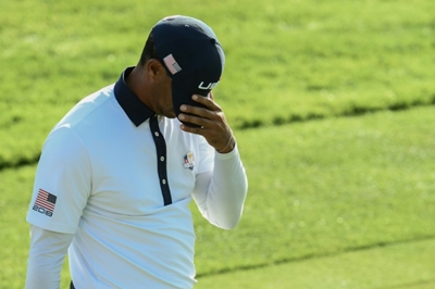 Tiger Woods urges calm over 'shocking' Floyd death