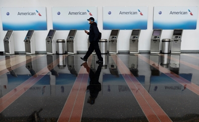 American Airlines says to start furloughing 19,000 workers