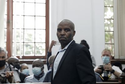 Parliament fire suspect charged with terrorism