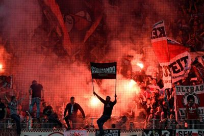 Volunteers and virtual beer: German fans take fight to virus