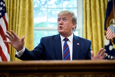 Trump says US intel chief Coats to leave office August 15