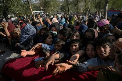 Biden unmoved on Afghan exit as Taliban sweep provinces