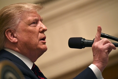 Trump defends Syria pullout, condemned by House in bipartisan vote