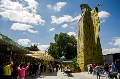 As pandemic rages, Mexicans pray to death 'saint' 