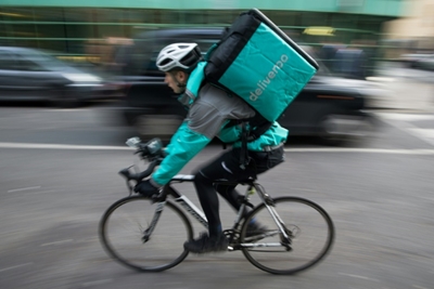 Amazon invests in British food courier Deliveroo