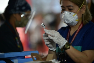 ADB trims Asia growth forecasts as Omicron threatens economy