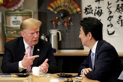 After sumo and golf, Trump and Abe get down to business