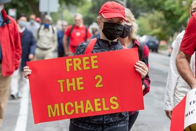 Marchers walk 7,000 steps for Canadian pair detained by China
