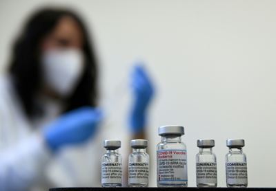 Asian markets mostly up, oil rallies as virus and Fed hold attention