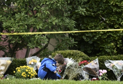 Synagogue shooter spoke of 'genocide,' police ID victims