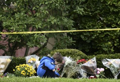 Synagogue shooter spoke of 'genocide,' police ID victims