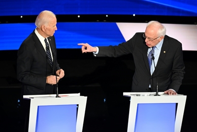 US Democrats lock horns over war, gender in last debate before Iowa