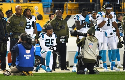 NFL protest kneeler Reid signs three-year Panthers deal