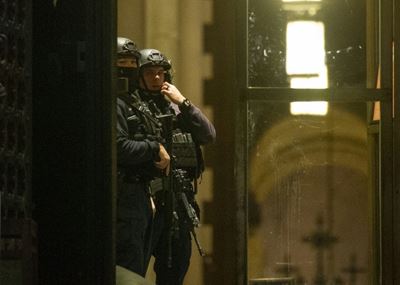 Gunman shot dead by police after New York Christmas concert