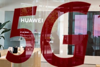 China urges 'fair' treatment after France restricts Huawei