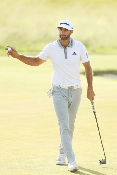 Low-key, long-hitting, Johnson reigns as number one