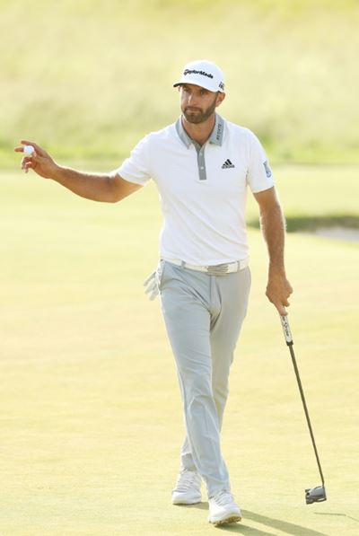 Low-key, long-hitting, Johnson reigns as number one
