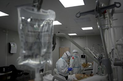Russians sickened by virus surge feel lucky to be in well-off Moscow