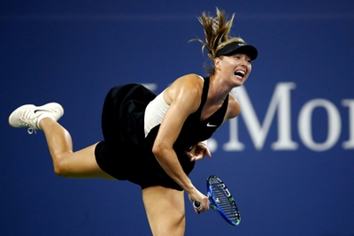 Sharapova downs battling 39-year-old Schnyder at US Open