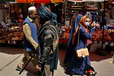 Taliban close to forming government as women protest