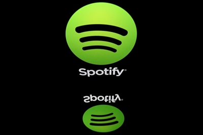Spotify posts rare profit as paying users hit 158 million